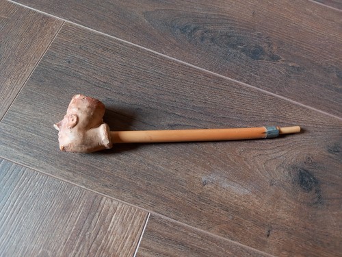 Pipa terracotta con testa