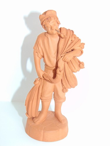 Statuina scultura argilla
